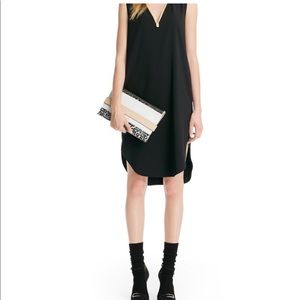 Coach Bleecker Clutch Handbag in Mixed Media